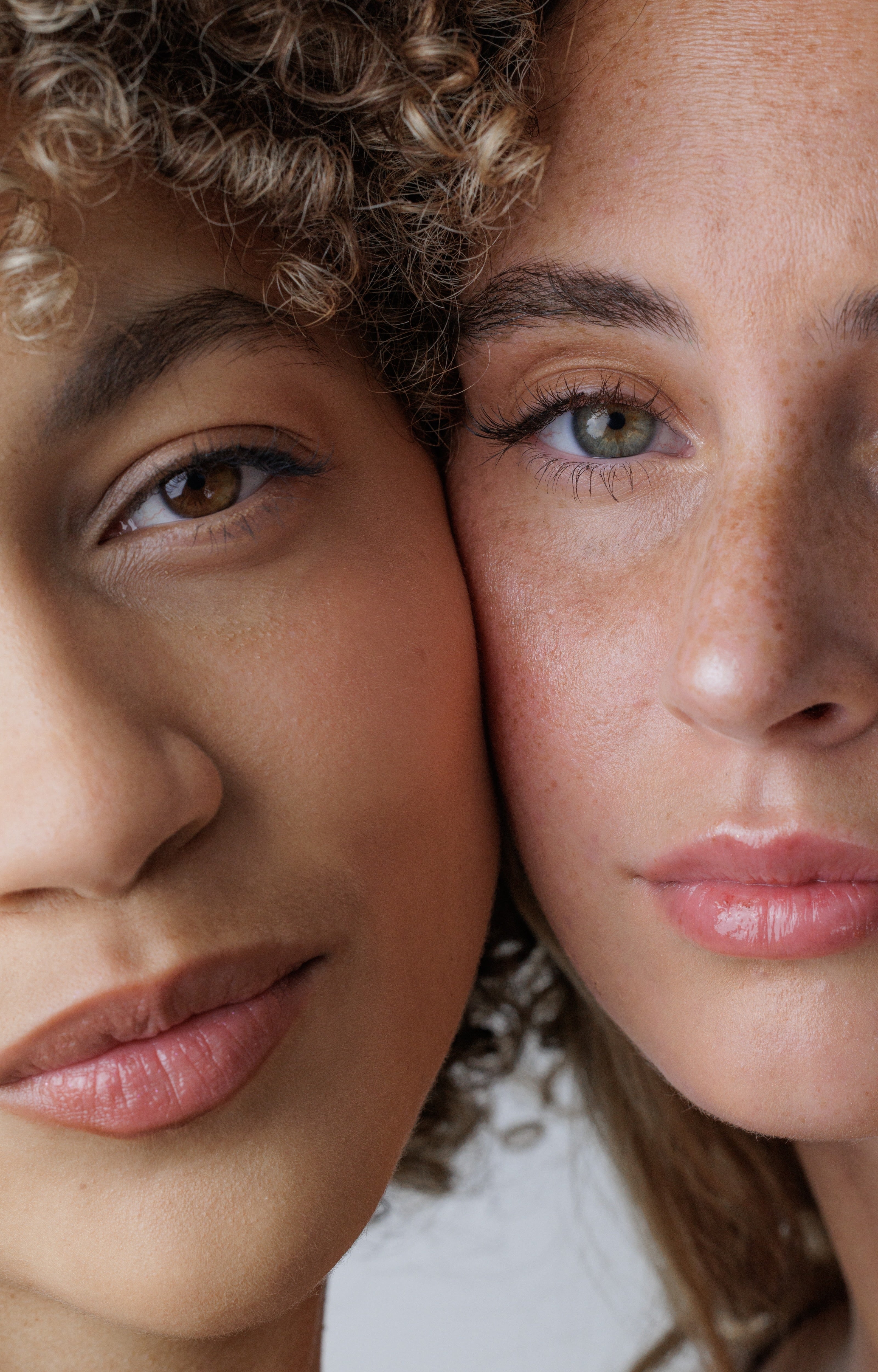 Close-up of two people with a neutral background